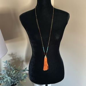 Long statement necklace -orange tassel with blue & bronze beading